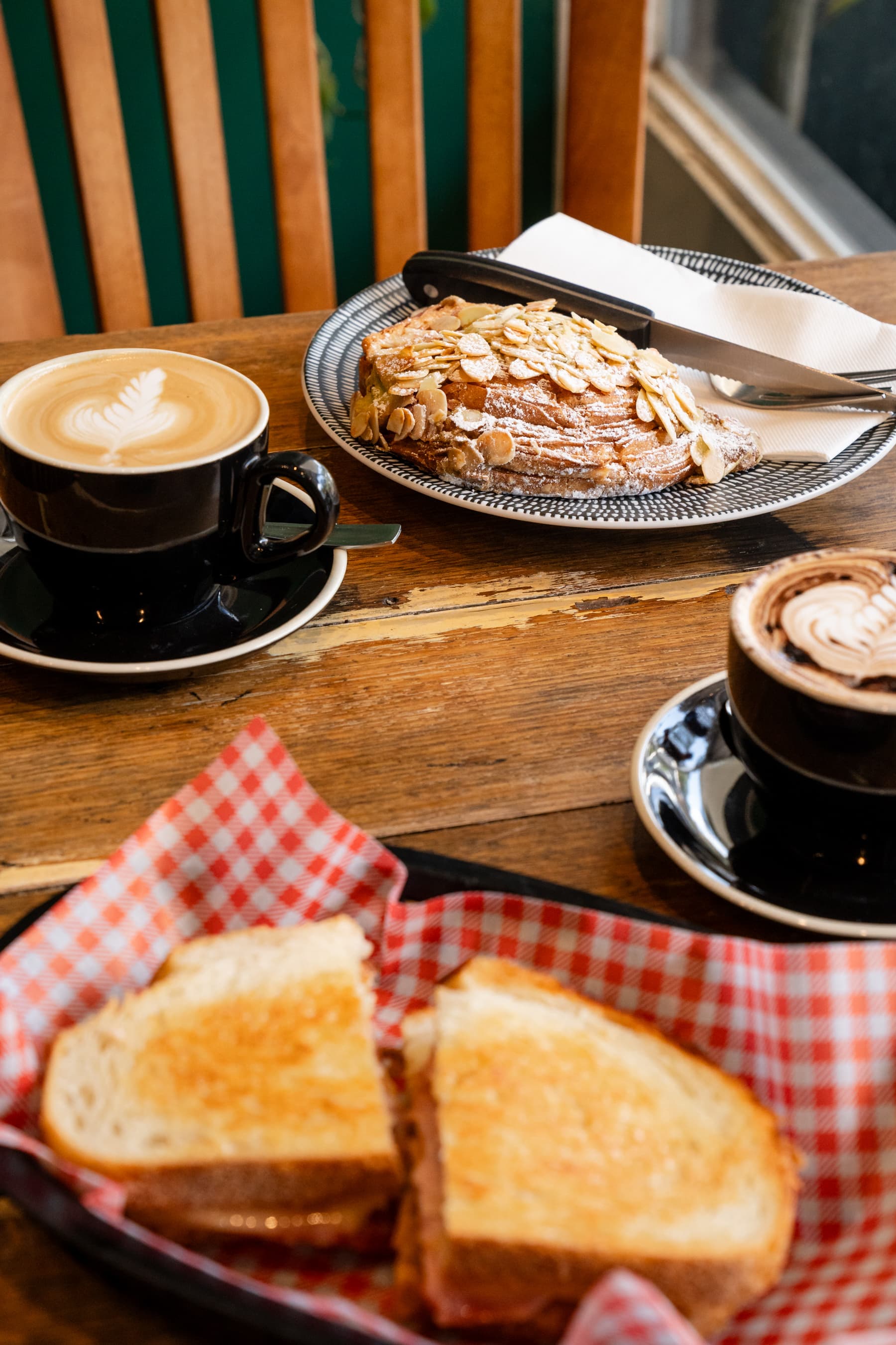 Latte, hot chocolate and almond croissant at Little Hendrix Cafe