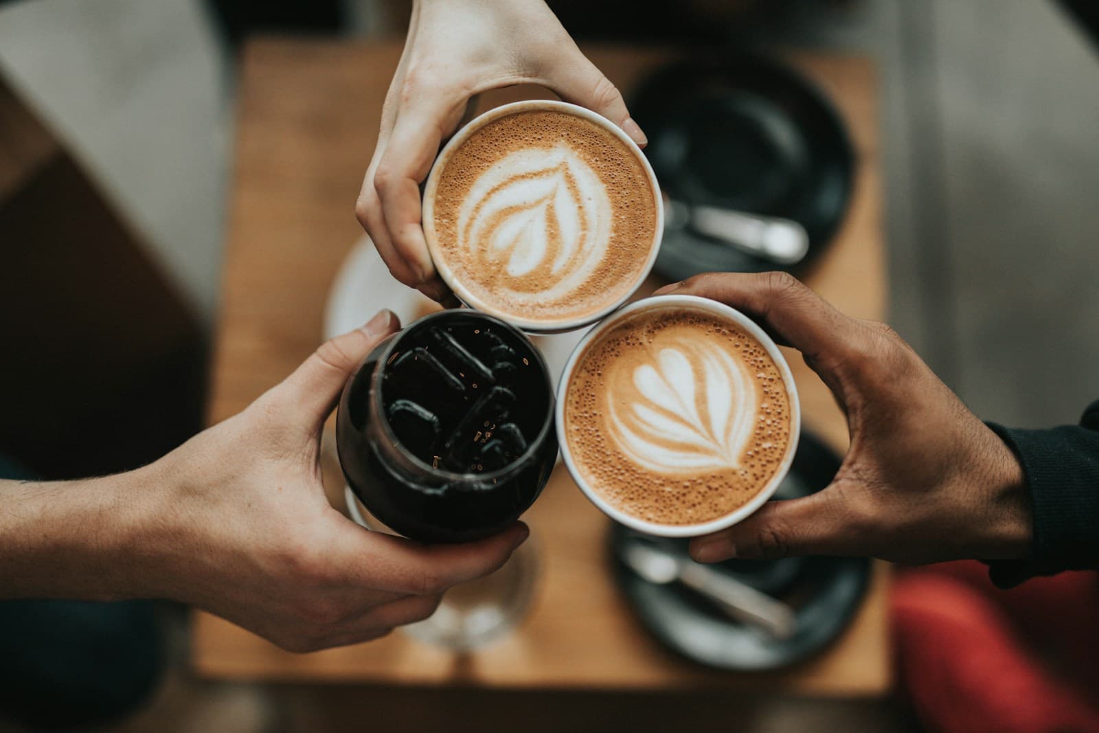 Specialty coffee being prepared in a warm cafe